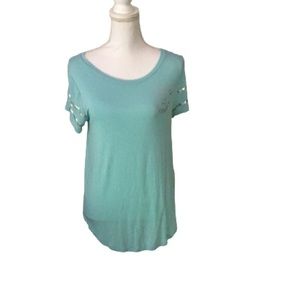 Hollister light blue tee shirt with silver Hollister emblem
